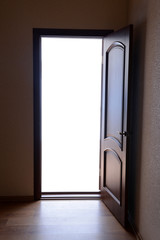 Obraz premium Open door with bright light outside
