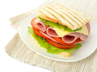 Tasty sandwich with ham, isolated on white