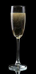 Glass of champagne, on black background
