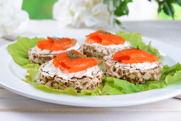 Delicious canapes on table close-up