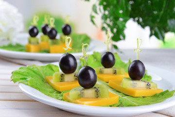 Delicious canapes on table close-up © Africa Studio