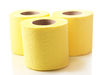 Color toilet paper rolls isolated on white