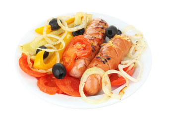 Grilled sausages with vegetables isolated on white