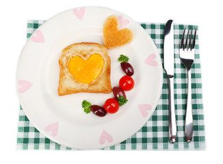 Scrambled eggs with bread on plate, on color napkin