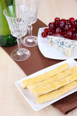 Cheese, grape and bread sticks
