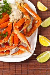 Snow Crab legs with fresh lemon slices