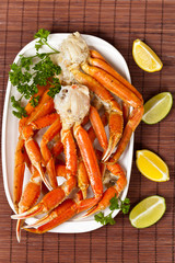 Snow Crab legs with fresh lemon slices