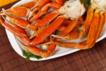 Snow Crab legs with fresh lemon slices