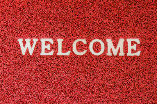 Red Doormat With Welcome Word