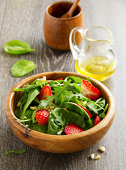 Light salad with spinach and strawberries.