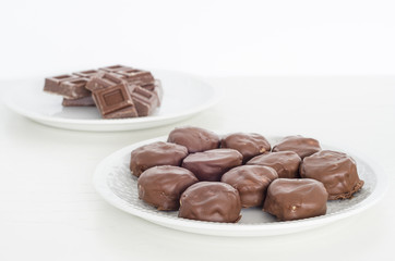 An assortment of fine chocolates in milk chocolate.