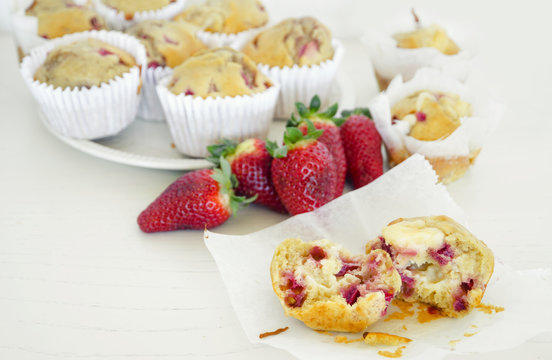 Homemade strawberry muffins in paper cupcake cases