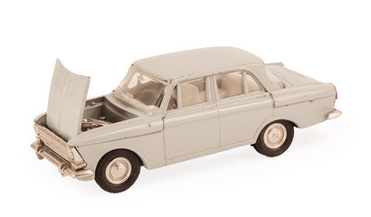 white children's toy car model with the hood open