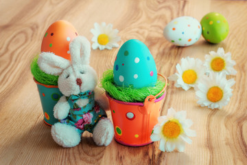 Obraz na płótnie Canvas Easter background with Bunny and Eggs
