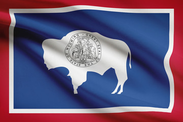 Series of ruffled flags of US states. State of Wyoming.