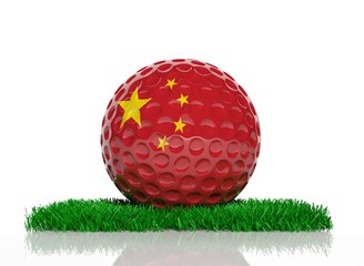 Golf ball with flag of China on green grass
