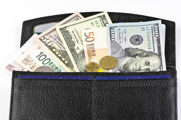 Various currencies in purse