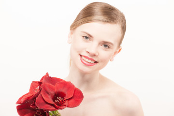 Portrait of beautiful young woman with clean face. High key shot