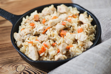 Pilaf with chicken, close-up, horizontal shot