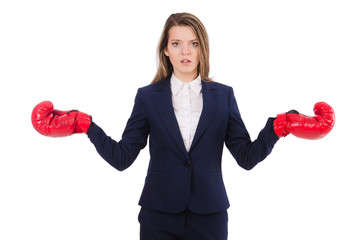 Woman businesswoman with boxing gloves on white