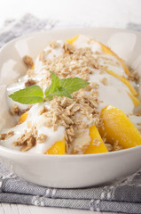 yogurt with mango piece and cereals
