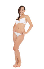 Attractive girl in white underwear. All on white background