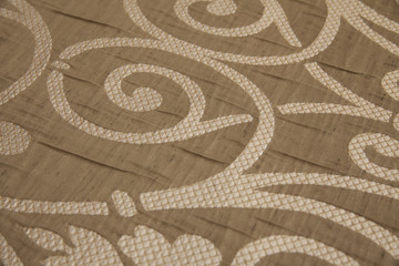 Fabric with floral design ornaments