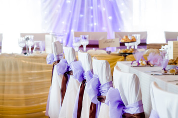 ribbon decoration on wedding chairs cover