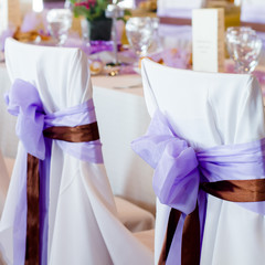 ribbon decoration on wedding chairs cover