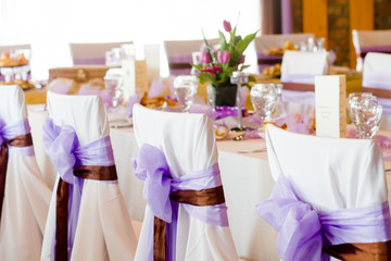 ribbon decoration on wedding chairs cover