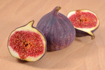 Fresh figs on wooden board