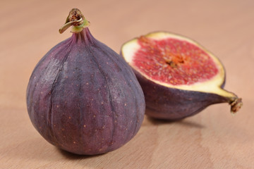 Fresh figs on wooden board