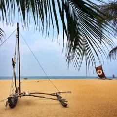 Foto op Canvas Fishing boat on the beach, Sri Lanka © naatphoto