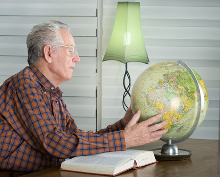 Old Man With Globe