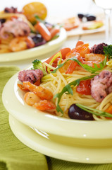 Seafood spaghetti pasta dish with octopus and shrimps