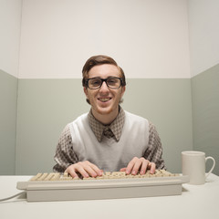 Vintage nerd on computer