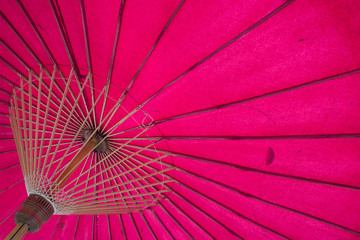 Structure under a pink umbrella