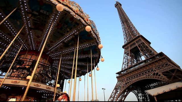 Merry go round in front of Eiffel tower in Paris