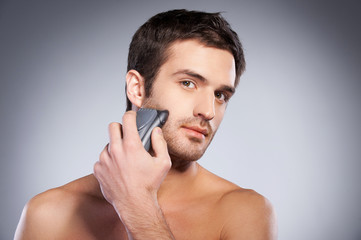 Man shaving.