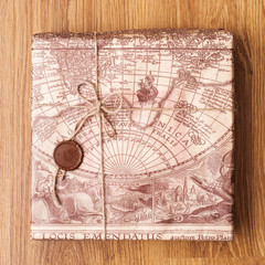 beautifully packaged parcel in brown paper and tied with a rope