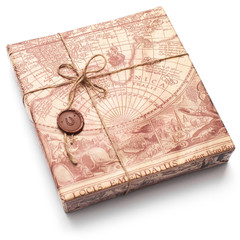beautifully packaged parcel in brown paper and tied with a rope