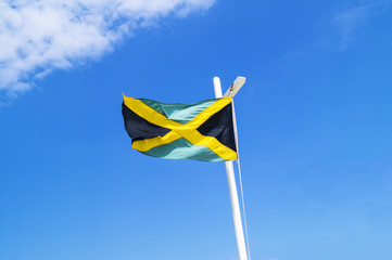 Jamaican National Flag On Blue Sky