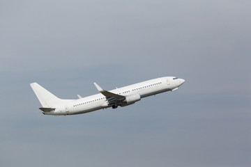 white plane takes off