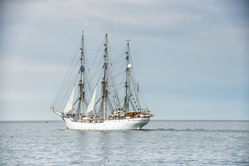 Tall ship on blue water horizontal