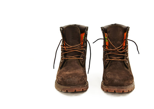 Photo of man's boots on white background
