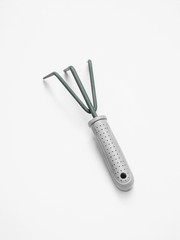 Obraz premium Garden rake on white background