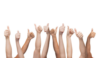 human hands showing thumbs up