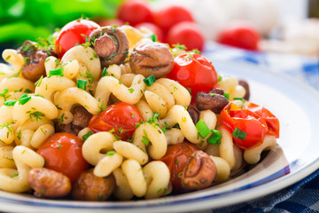 Pasta with roasted mushrooms and cherry tomatoes