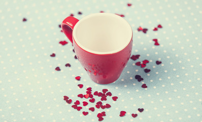 Cup of a coffe on polka dot cover