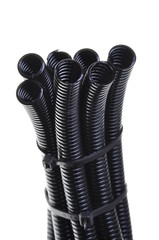 Black corrugated pipe isolated on white background 